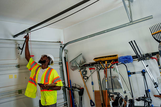 Professional Garage Door Roller Replacement technician working in Clare, MI